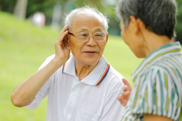 senior having a difficult time hearing